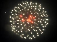 5 inch shell white strobe w/red crossette. Professional RedWire fireworks, distributed by Xena Vuurwerk from Holland