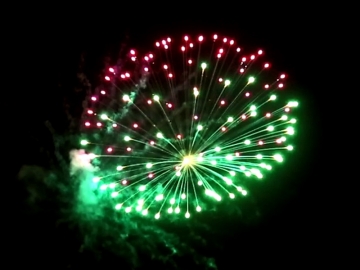 Red Wire professional fireworks 4 inch shell : Half green- half purple. Available in assorted 4" shells at Xena Vuurwerk